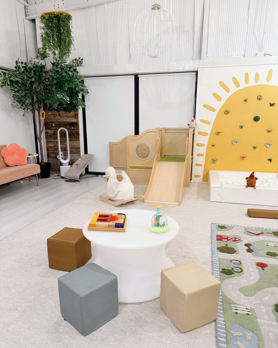 Whimsical Forest playroom with the big sunshine arch and soft seats