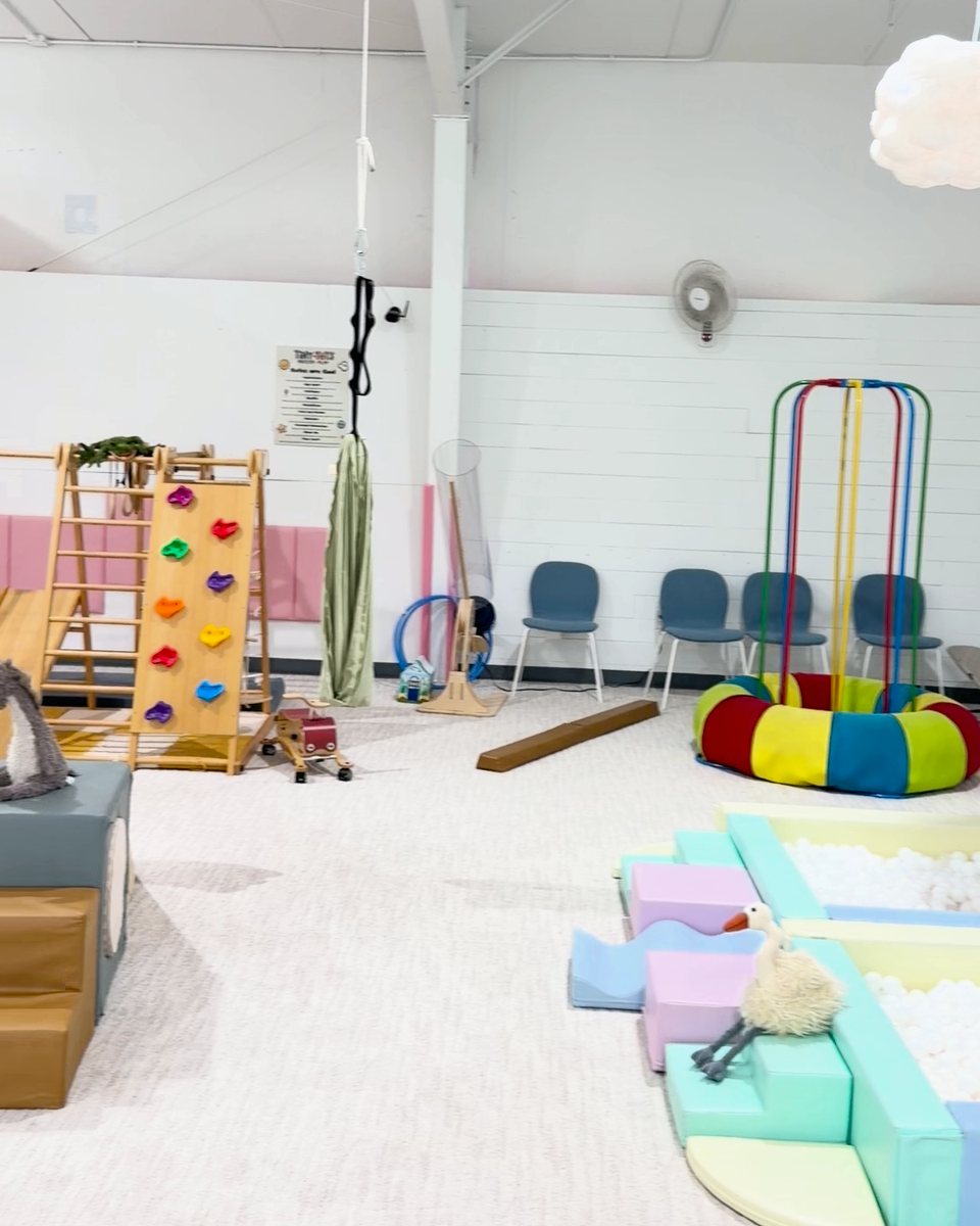 Climbing wall, balance beams and soft blocks in the climbing gym